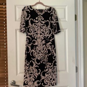 Beautiful Dress! Cinched on side flatters the waist